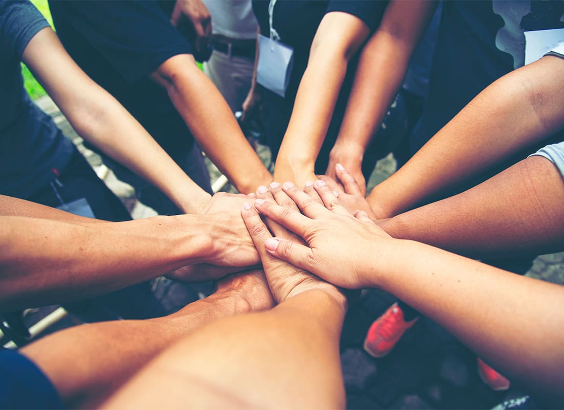 Community - People Uniting Together and Accomplishing Teamwork Outside