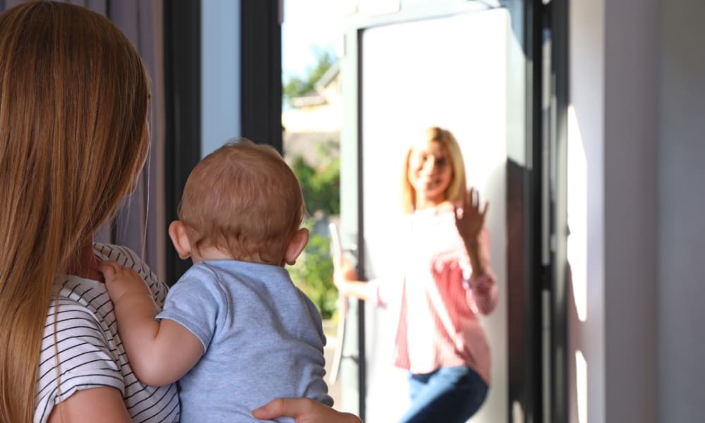 Does your home insurance cover domestic employees? Woman leaving baby with au pair.