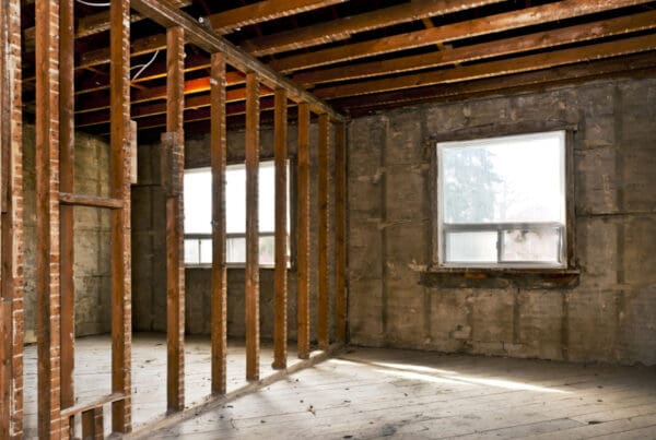 Eliminating Odors in Your Home: A CT Family’s Surprise Behind the Wall. Bedroom with open walls.